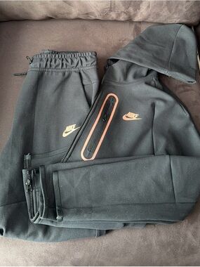 Nike Tech Black Jogger & Hoodie Set with Orange Logo Accents